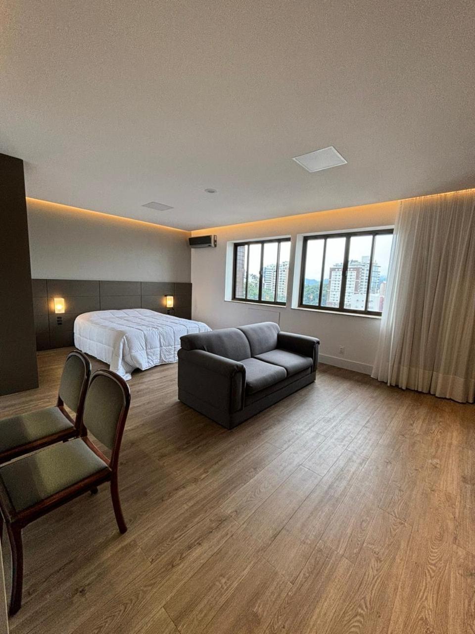 Apart Hotel Moderno Em Жоїнвіль Екстер'єр фото